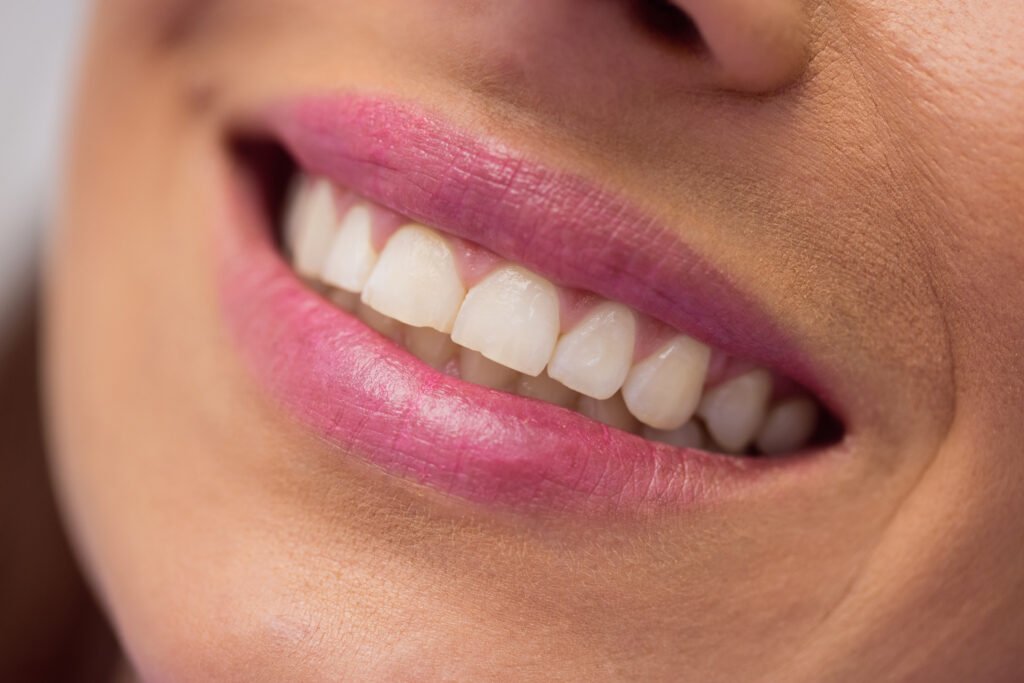 Close-up of female patient receiving a dental treatment at clinic